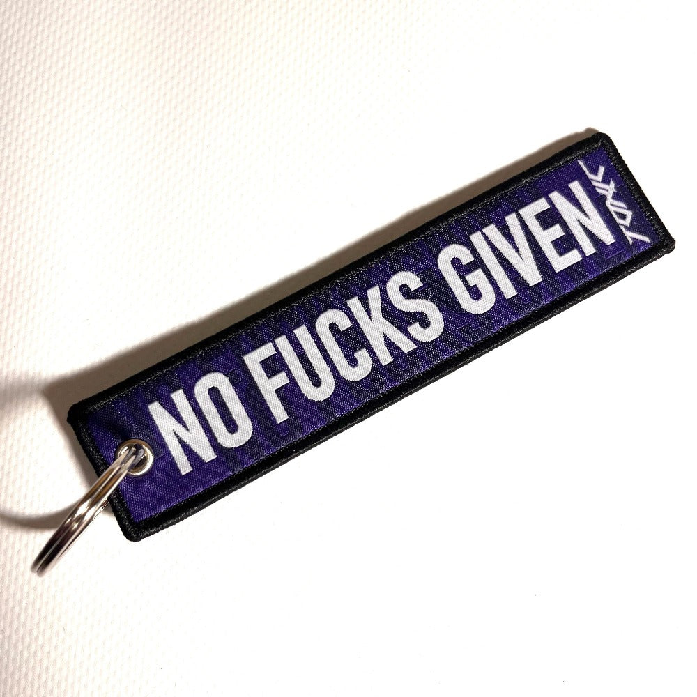 NO FUCKS GIVEN purple key tag